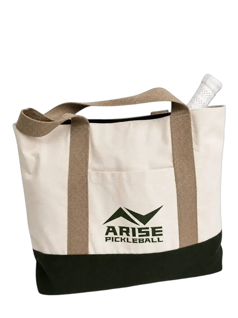 PREMIUM PLUS Shopping Bag in natural canvas with a dark green base, side pocket and tan webbing handles, printed for Arise Pickleball